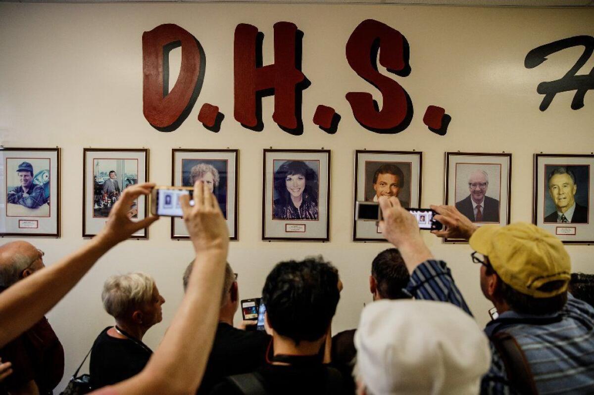 Fans of the Carpenters visit Downey High School, which the musical siblings attended, last month.