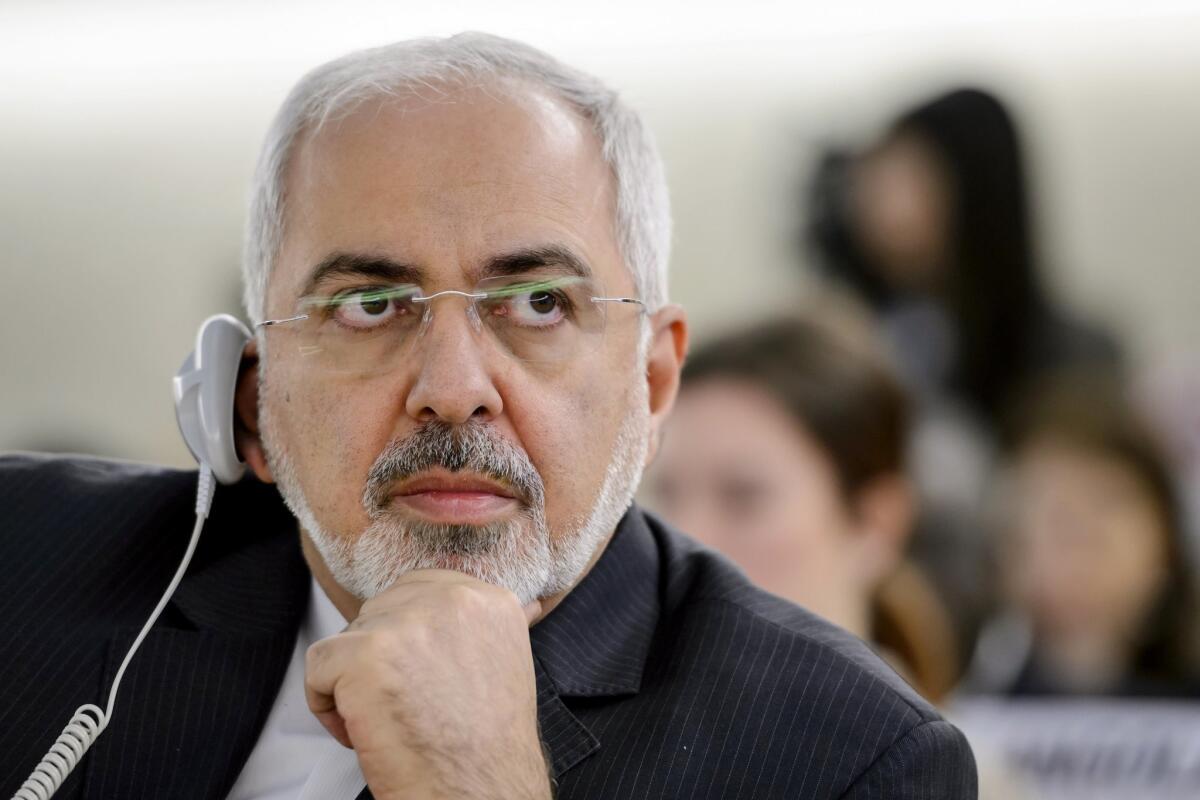 Iranian Foreign Minister Javad Zarif, shown at the United Nations in Geneva in March, says that a letter from Senate Republicans about negotiations for a nuclear deal with Tehran suggests that the U.S. is "not trustworthy."