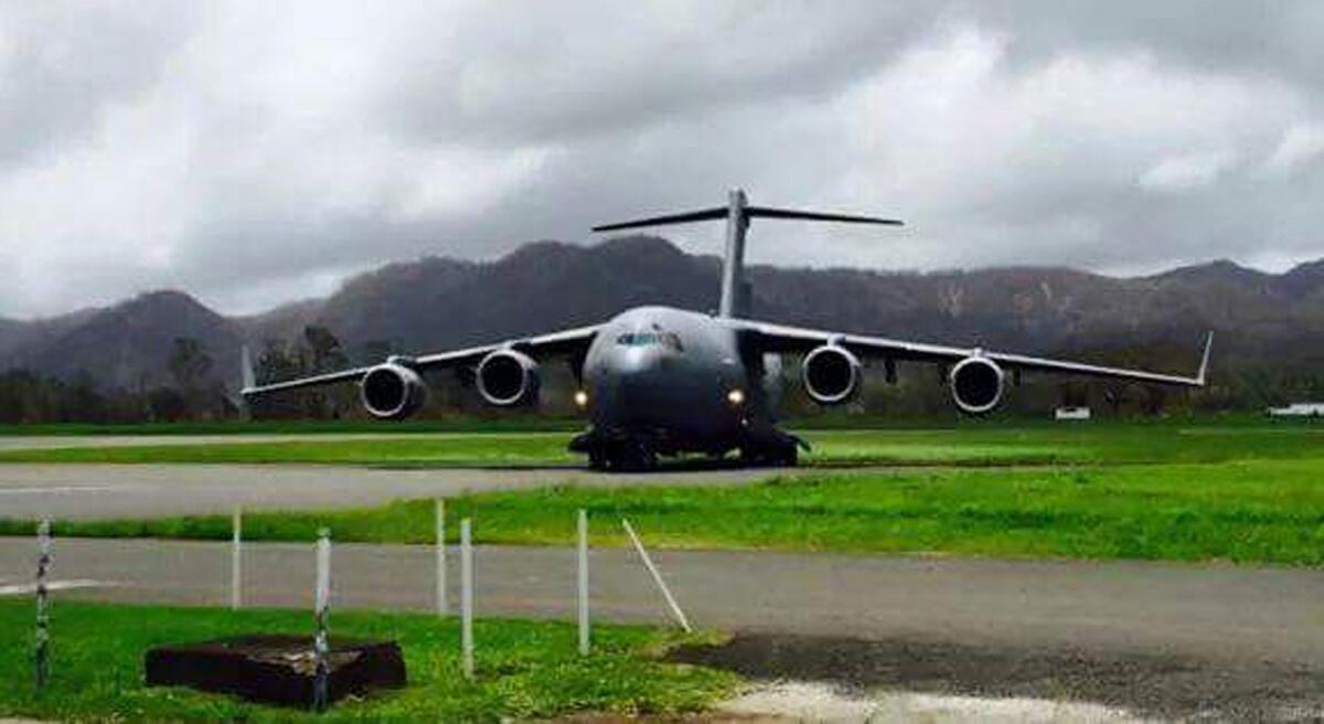 A plane carrying relief for Vanuatu lands at the capital, Port Vila.