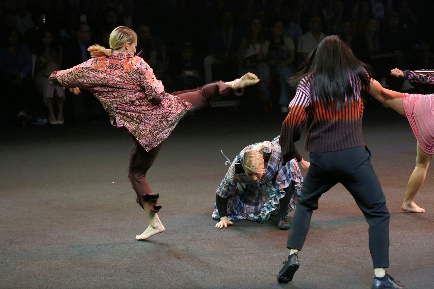 The finale of the Opening Ceremony show included a carefully orchestrated martial arts fight that paid homage to both powerful women and the designers' heritage.