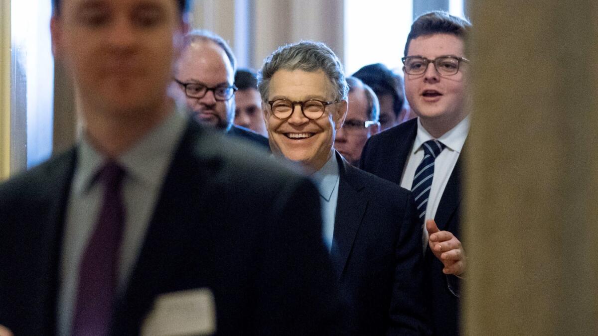 Sen. Al Franken (D-Minn.) leaves the Capitol on Dec. 7 after announcing that he would resign from the Senate in coming weeks.