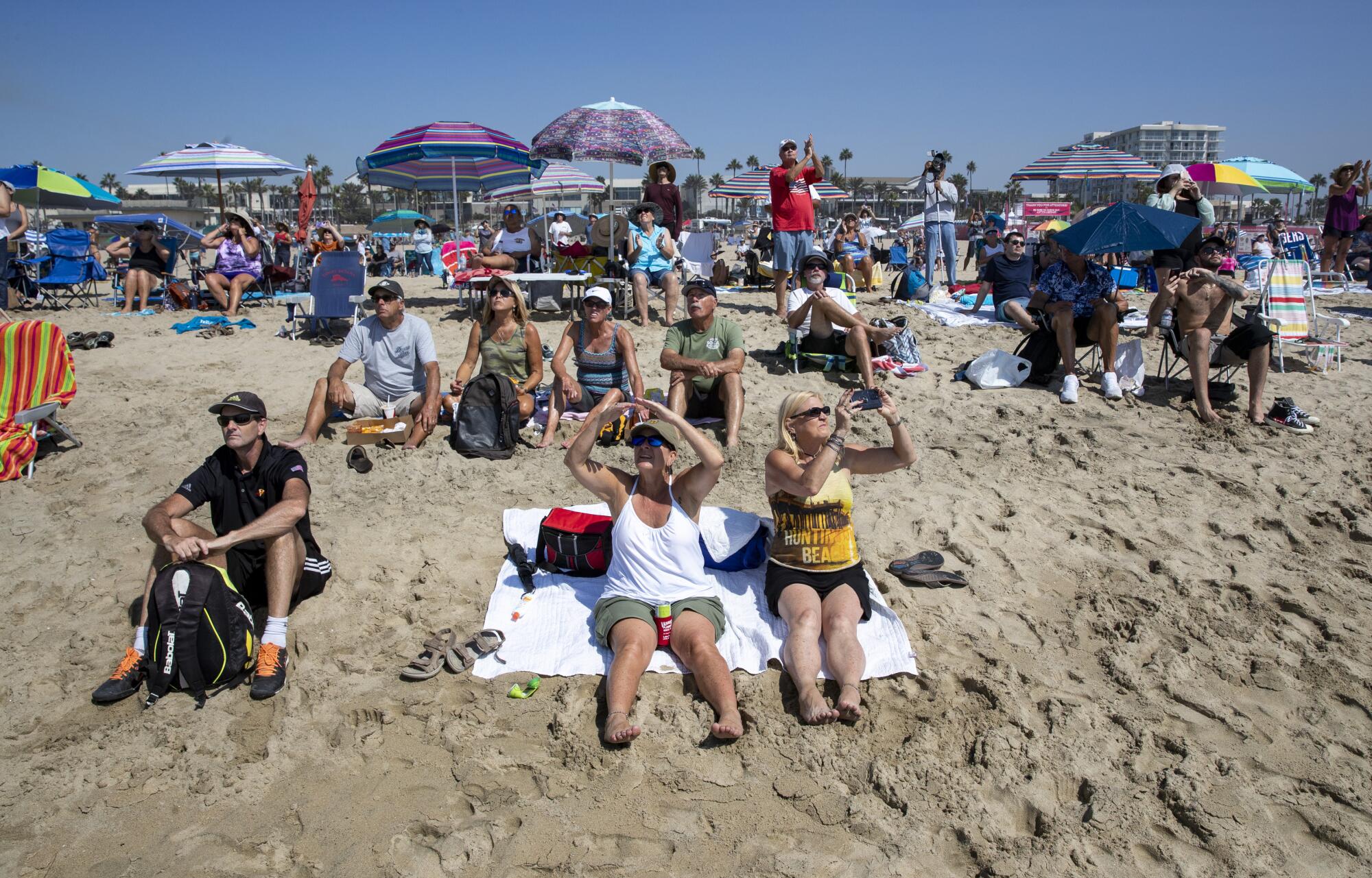  Spectators watch as aircraft perform during the Pacific Airshow