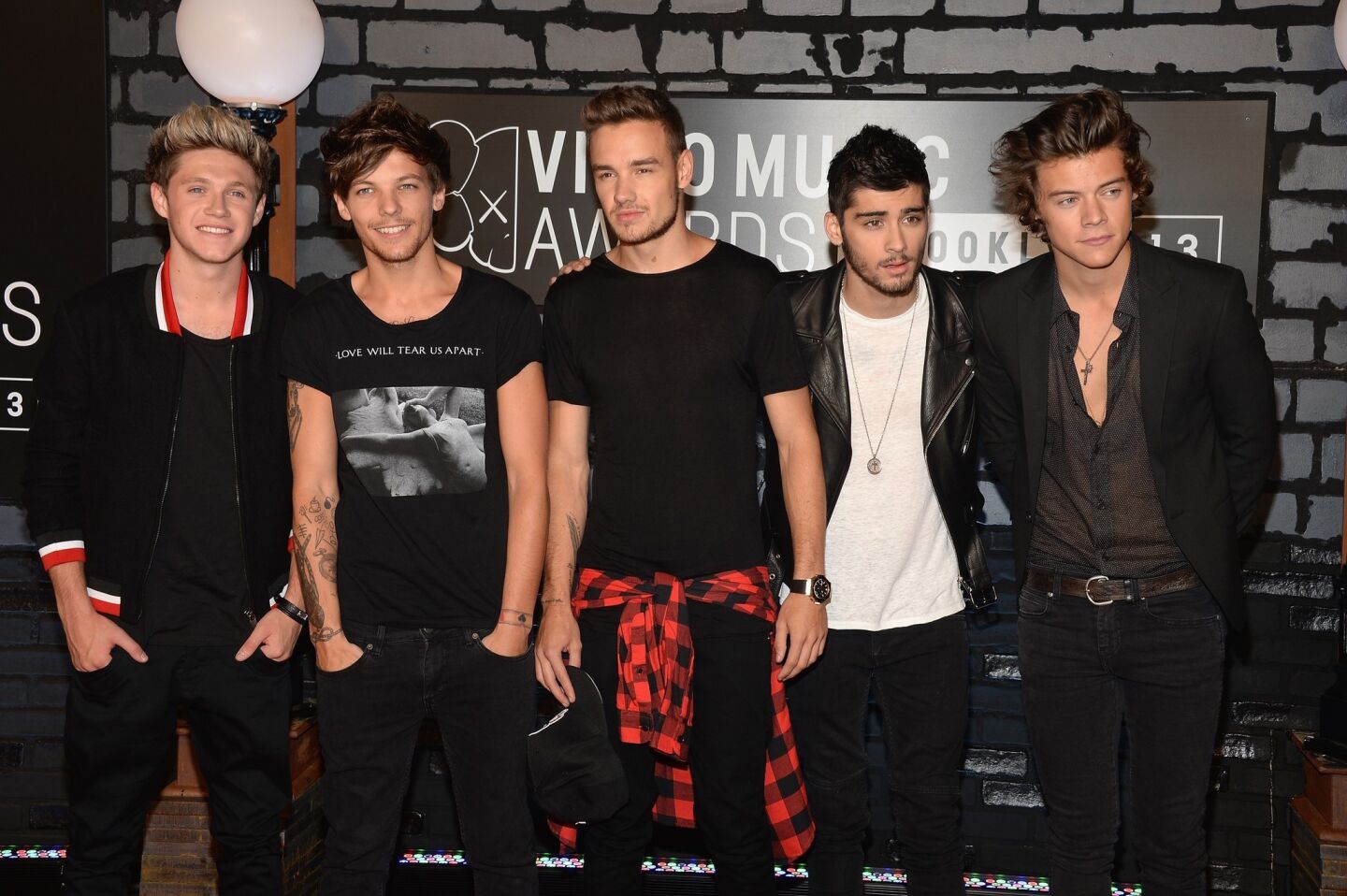 Niall Horan, left, Louis Tomlinson, Liam Payne, Zayn Malik and Harry Styles of One Direction.