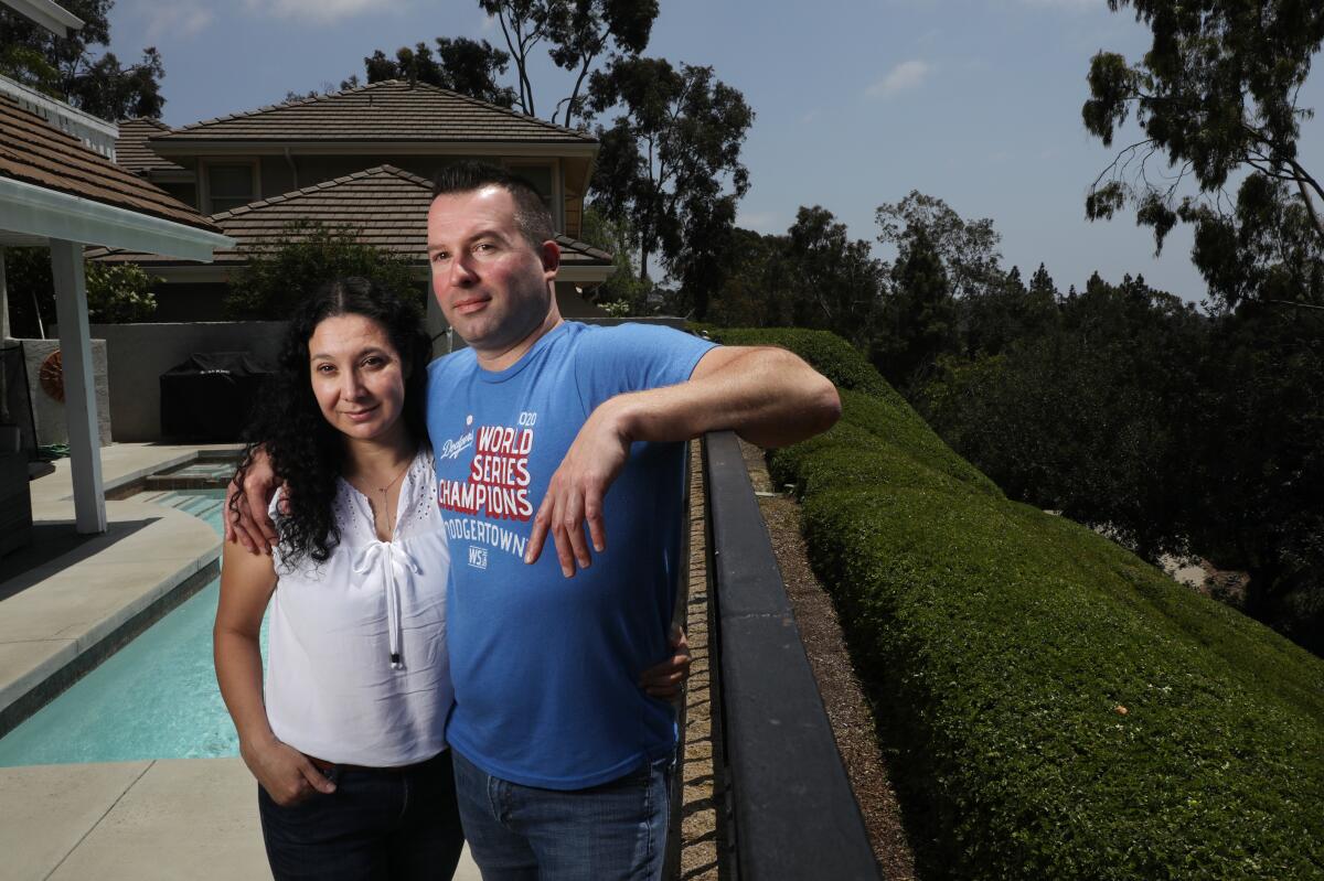 Nathan and Esther Smith at their home in Laguna Niguel.