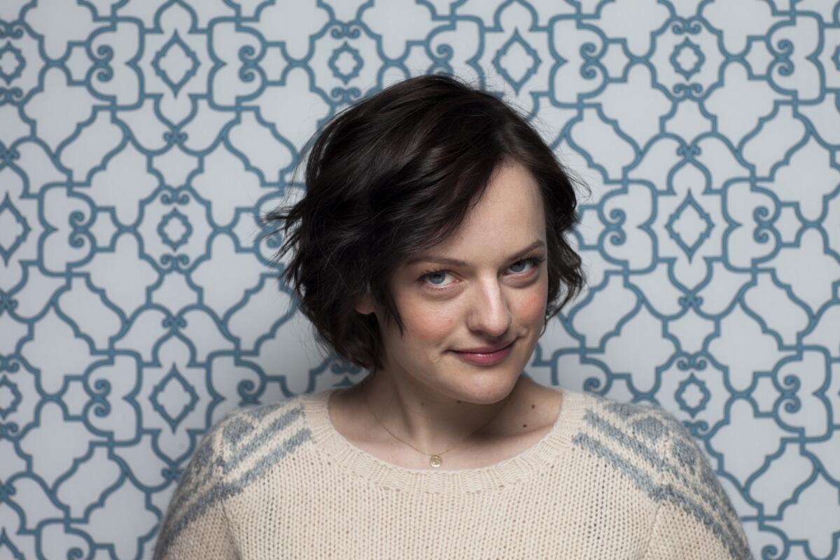 Elisabeth Moss, photographed at the 2014 Sundance Film Festival, will star in Hulu's adaptation of "The Handmaid's Tale" in 2017.