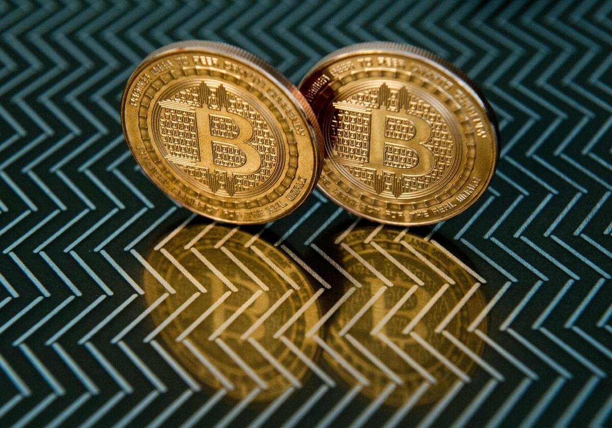 Bitcoin medals are displayed in Washington on June 17, 2014.