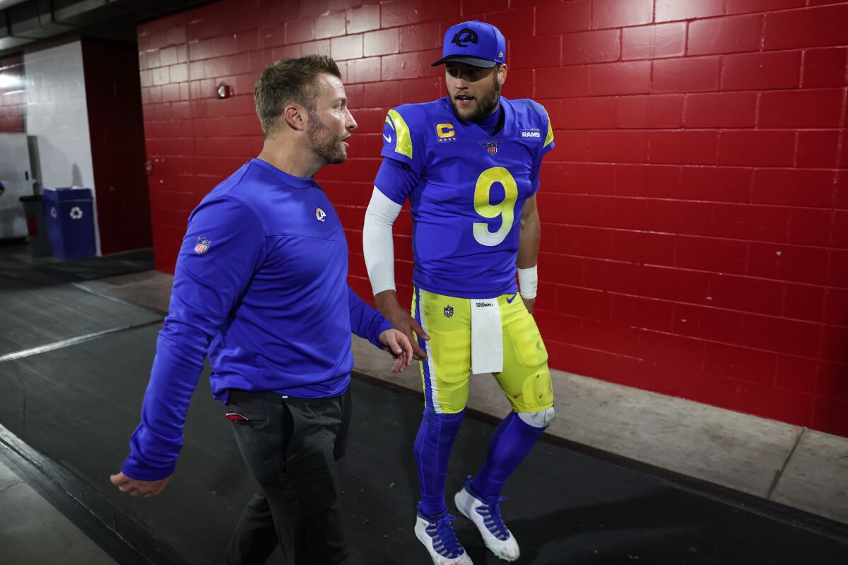 Rams coach Sean McVay and quarterback Matthew Stafford head to the locker room