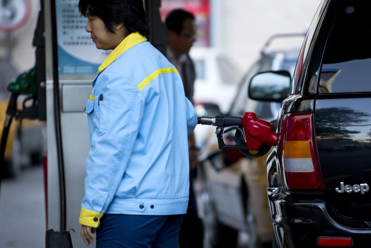China passed the United States in September as the world's biggest net oil importer, driven by faster economic growth and strong auto sales, according to U.S. government data released this week.