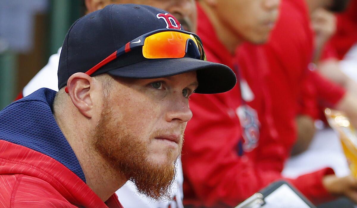Boston Red Sox relief pitcher Craig Kimbrel looks on from the dugout during the eighth inning against the Tampa Bay Rays on Saturday.