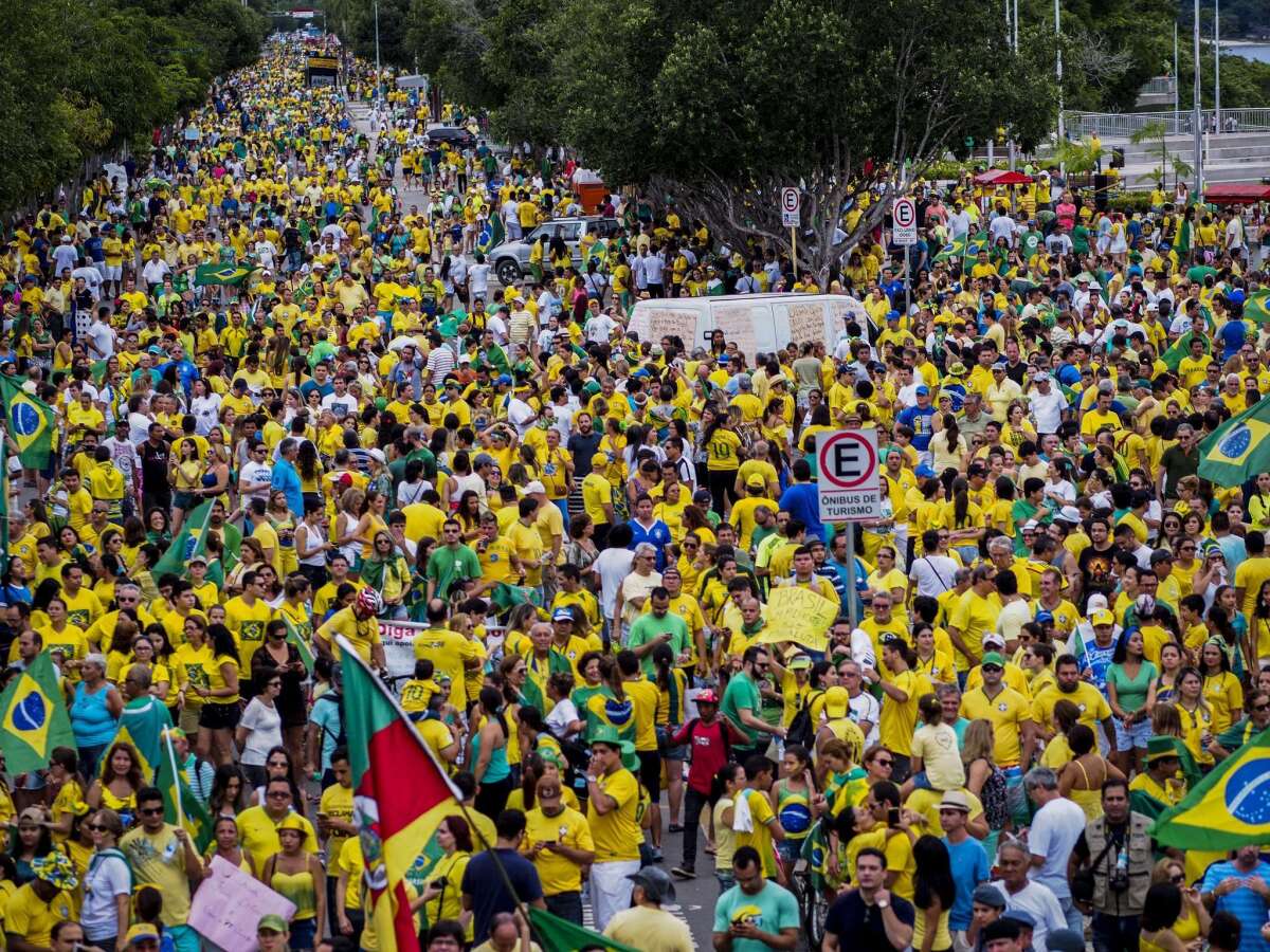 Hundreds of thousands gathered Sunday in antigovernment protests in cities and towns across Brazil.