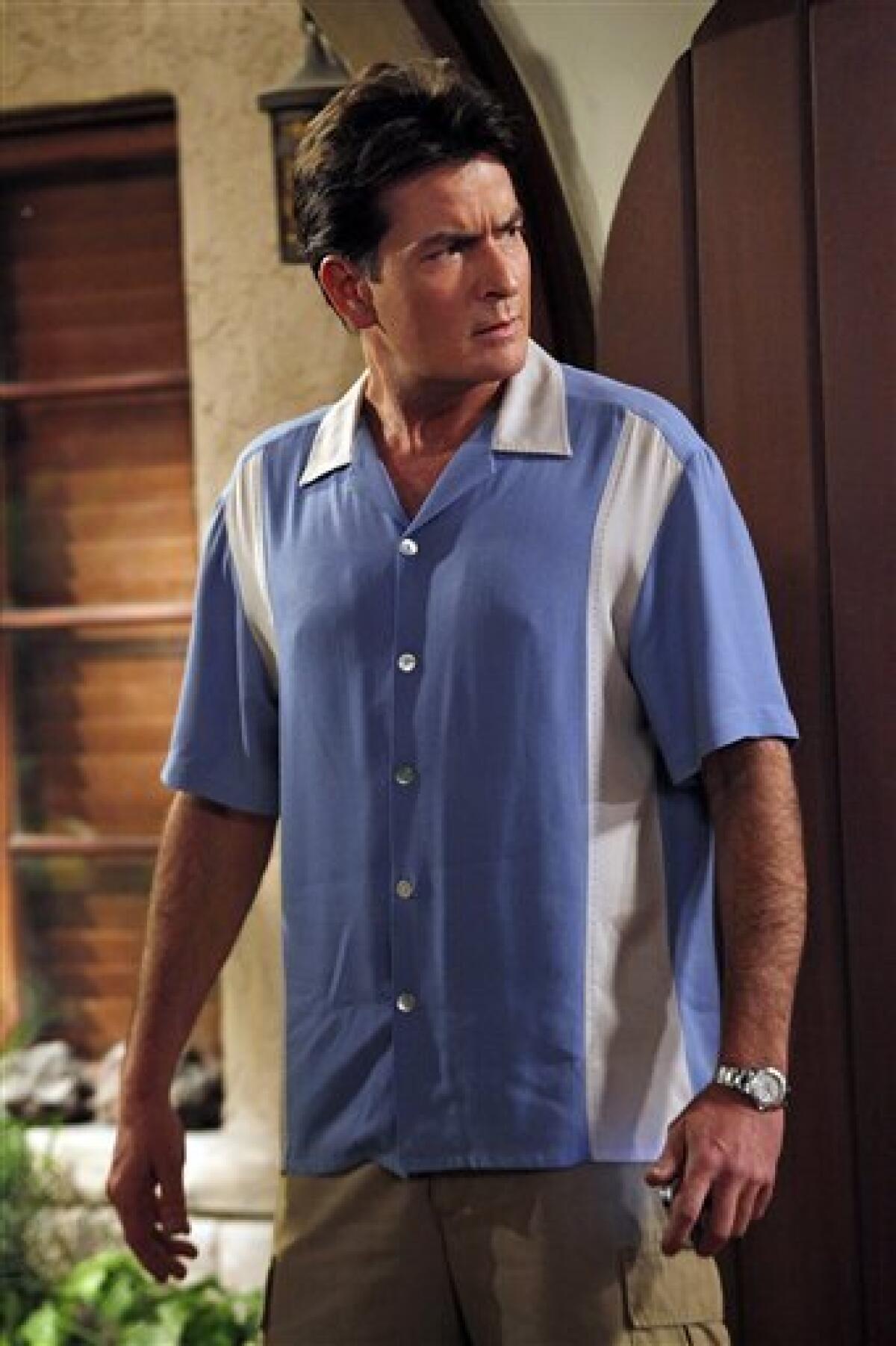 FILE - In this file image released by CBS, Charlie Sheen is shown in a scene from the CBS comedy, "Two and a Half Men." Sheen is looking at a future without "Two and a Half Men." Sheen's desire to exit the sitcom was reported by People magazine online Thursday April 1, 2010. (AP Photo/CBS, Greg Gayne, File) MANDATORY CREDIT; NO ARCHIVE; NO SALES; NORTH AMERICA USE ONLY