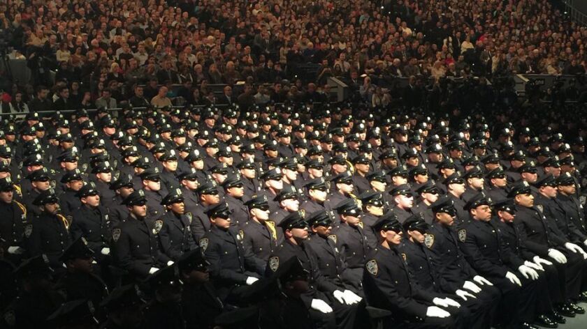 New recruits attend a graduation ceremony at Madison Square Garden. The New York Police Department will now allow officers to begin wearing beards and turbans for religious reasons.