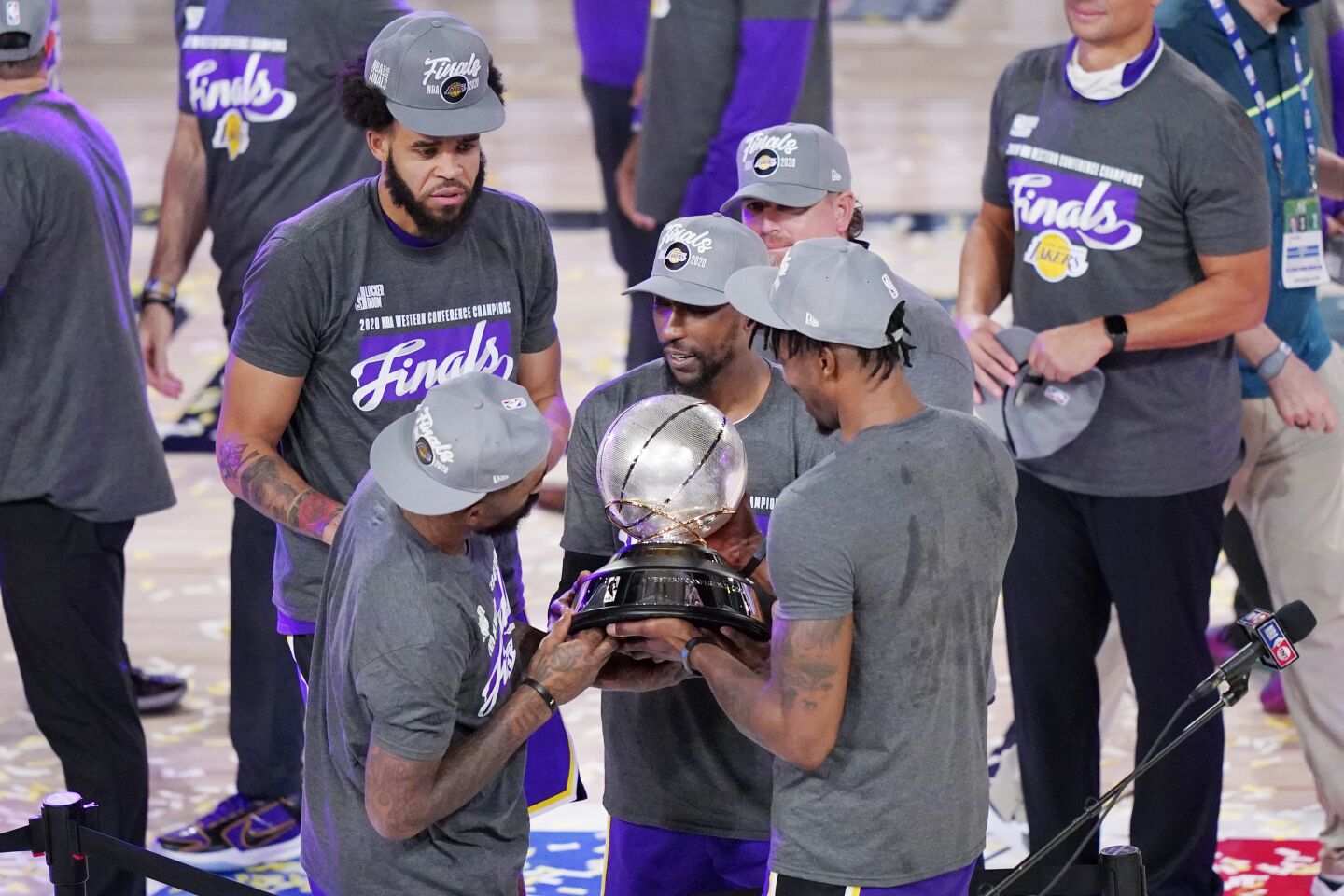 Lakers check out the Western Conference championship trophy after defeating Denver in Game 5.