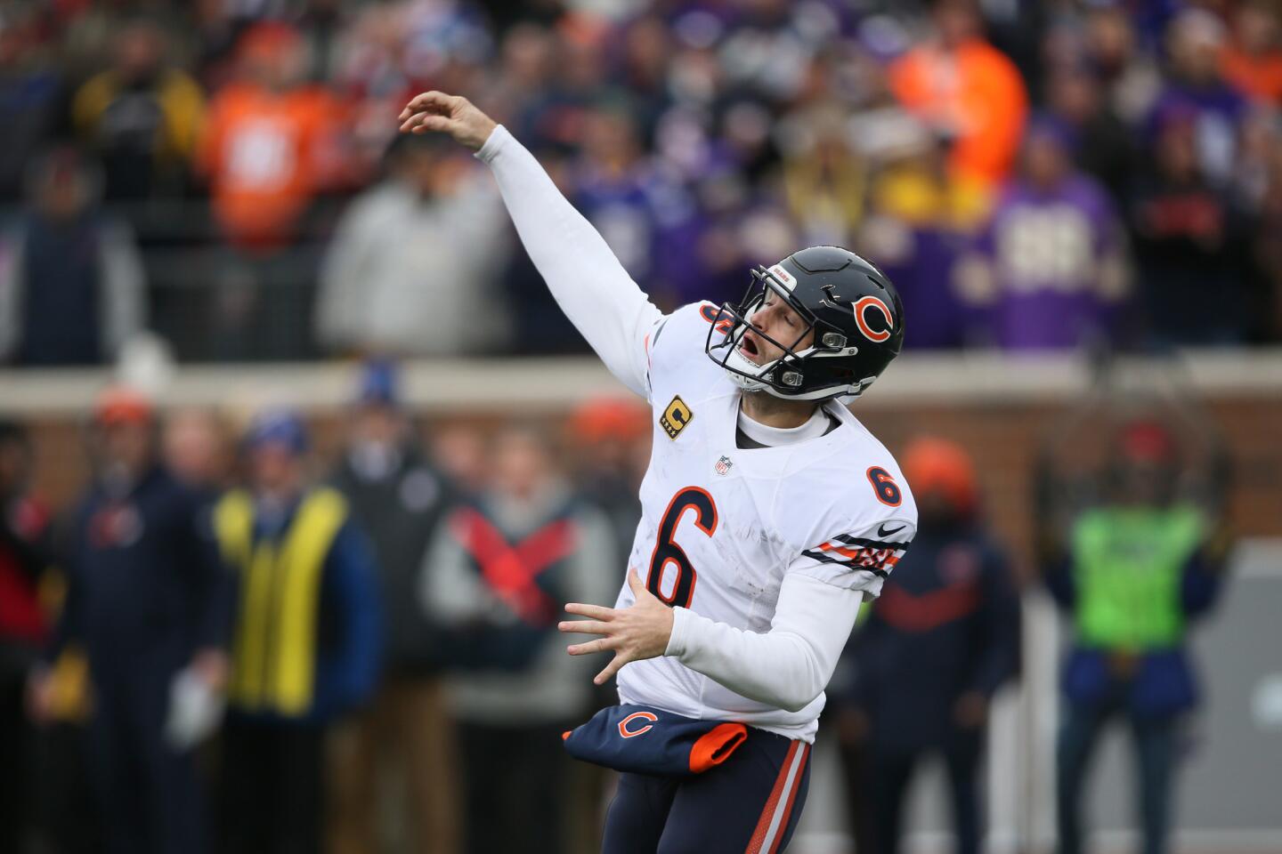 Jay Cutler closes his eyes after throwing a pass during the second half of a game against the Vikings.