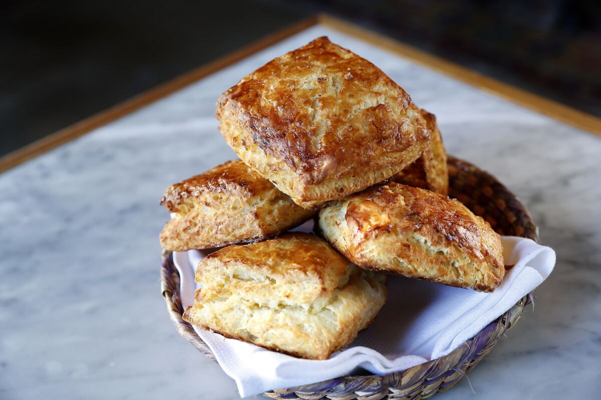 A basket of buttermilk biscuits, made with European-style butter.