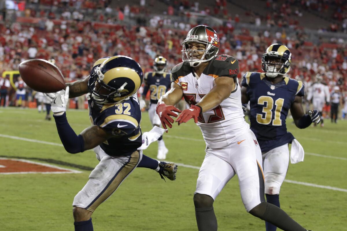 Rams defensive back Troy Hill breaks up a pass in the end zone intended for Buccaneers receiver Vincent Jackson with seconds remaining in Sunday's game.