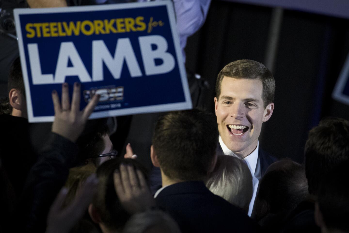Conor Lamb, Democratic congressional candidate for Pennsylvania's 18th district, greets supporters at an election night rally March 14, 2018, in Canonsburg, Pa.