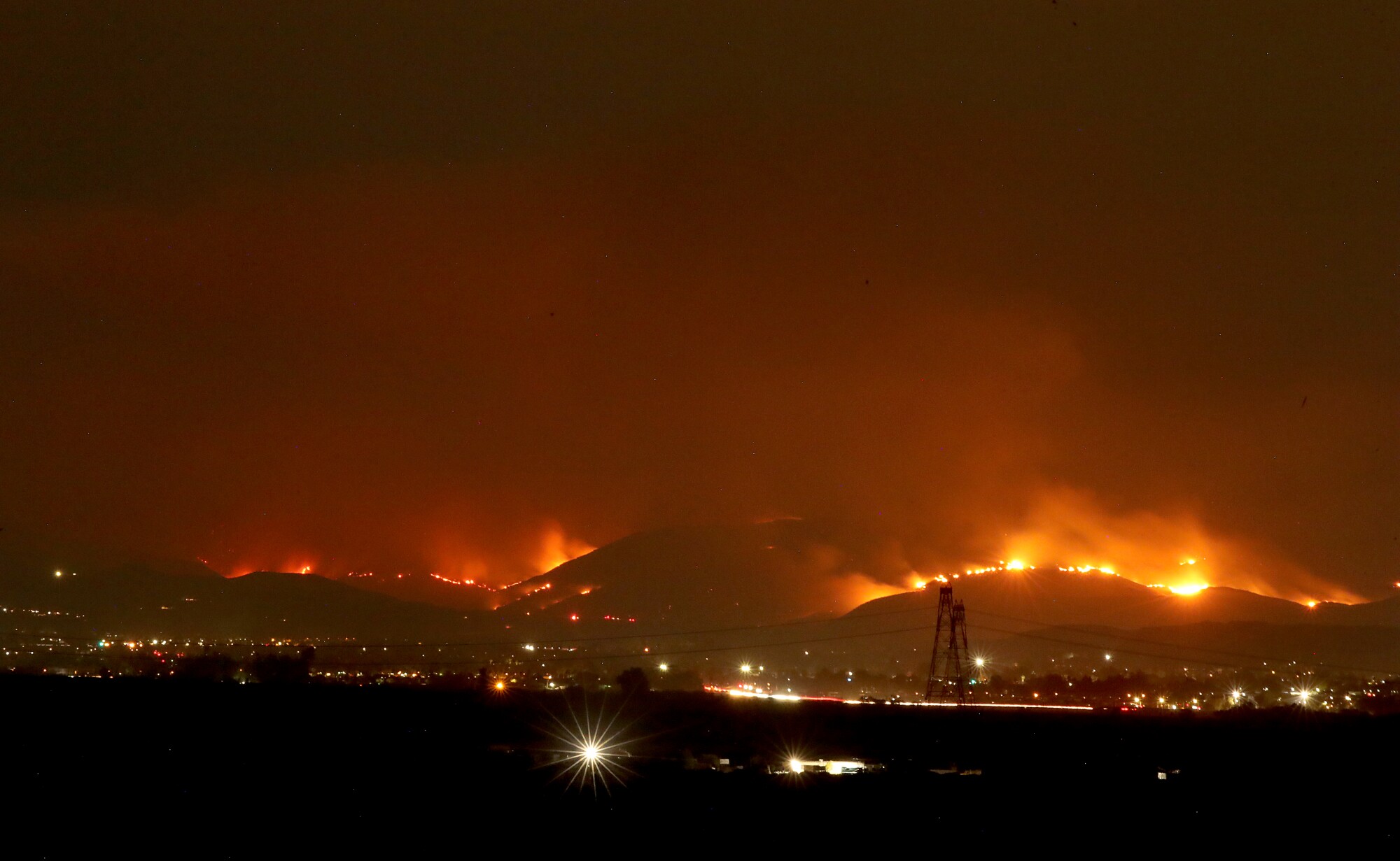 The Fairview fire lights up the night sky over Hemet  