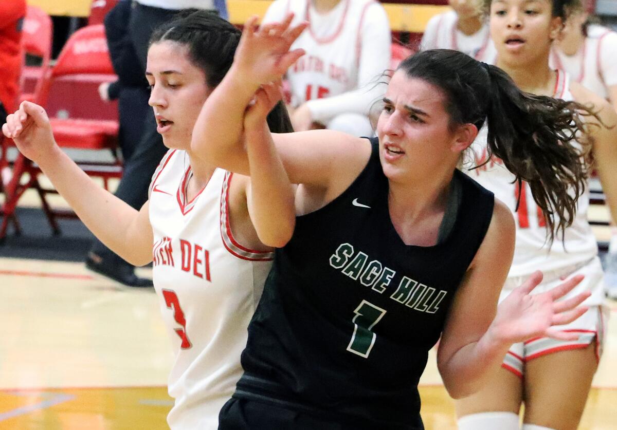 Sage Hill's Emily Eadie (1), right, seen against Mater Dei on March 1, 2023.
