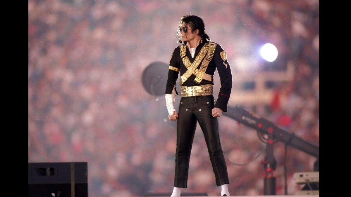 Michael Jackson performs in 1993 during halftime at Super Bowl XXVII between the Dallas Cowboys and the Buffalo Bills at the Rose Bowl in Pasadena.