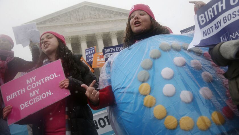 Trump administration rules would allow more employers to opt out of providing women with no-cost birth control. Above, protesters in front of the U.S. Supreme Court in 2015.