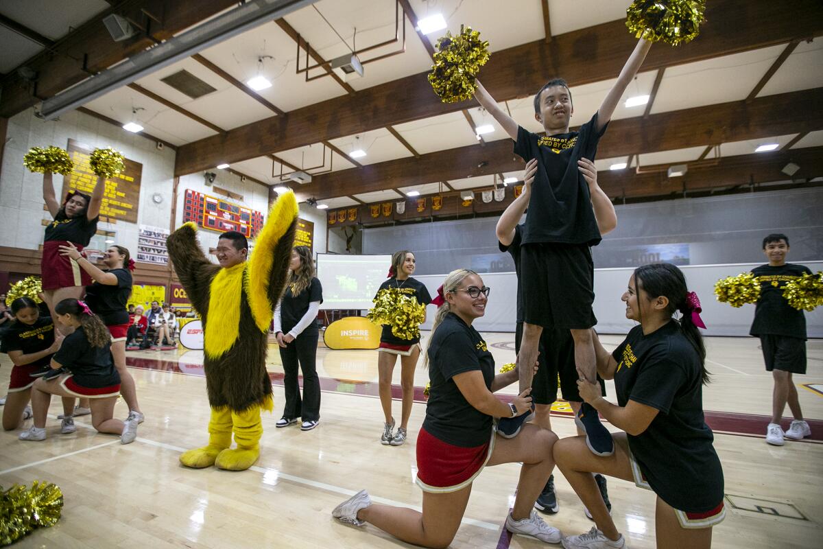 Members of the Unified cheer team perform during an assembly on Nov. 16.