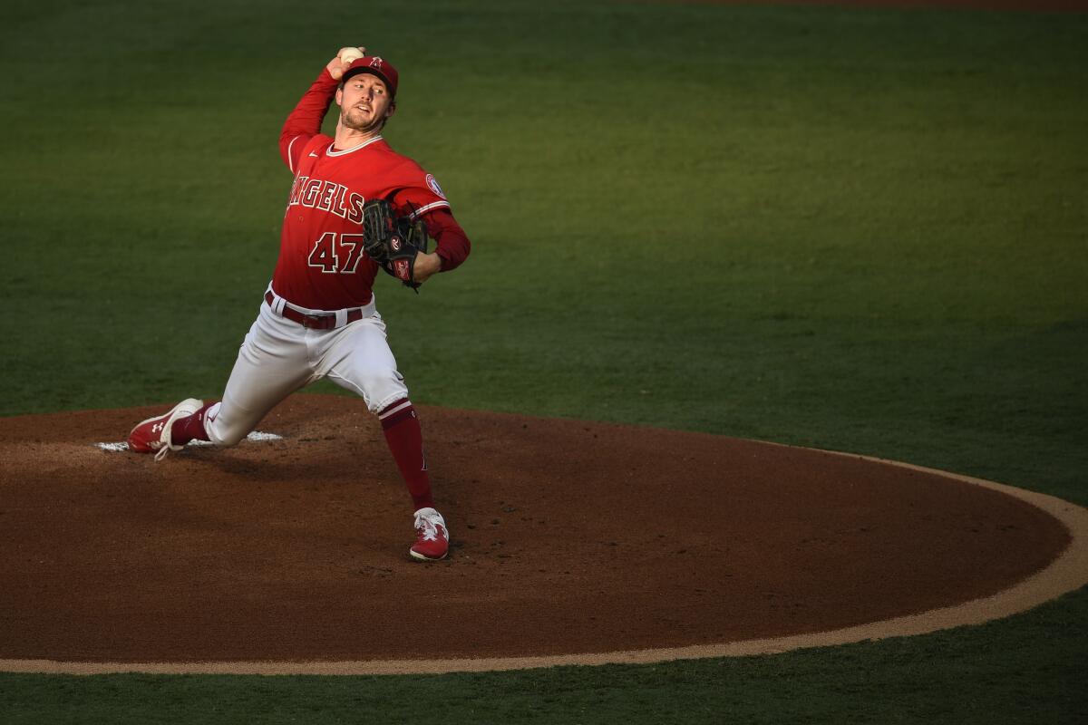 Angels starting pitcher Griffin Canning throws against the Giants.