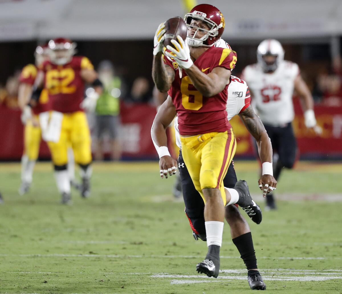 USC wide receiver Michael Pittman makes a big catch against Utah in the fourth quarter at the Coliseum on Friday.