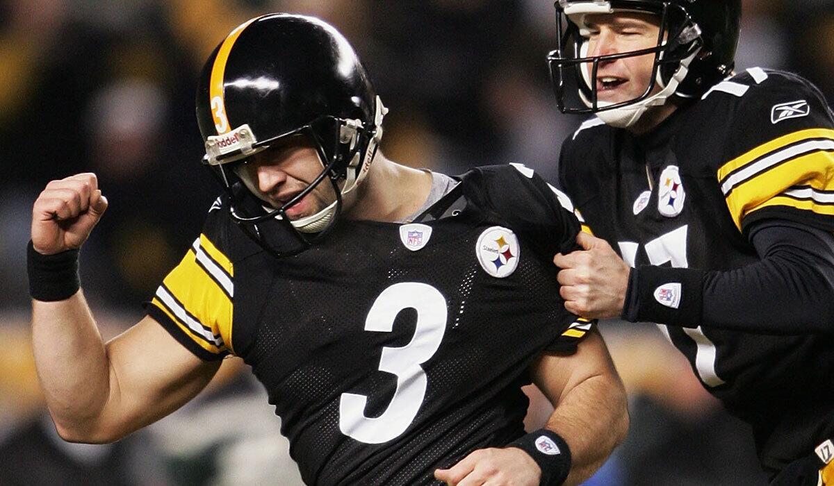 Steelers kicker Jeff Reed (3) and holder Chris Gardocki celebrate Reed's game-winning field goal against the New York Jets in January 2005.