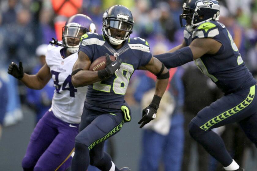 Seahawks cornerback Walter Thurmond returns an interception for a touchdown against the Minnesota Vikings earlier this season.