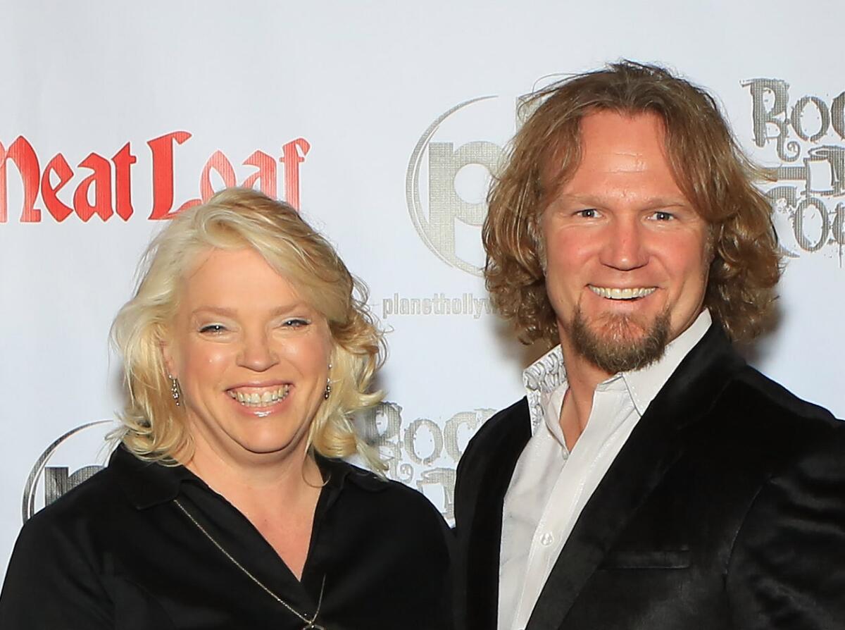 LAS VEGAS, NV - OCTOBER 03: (L-R) Television personalities Janelle Brown, Kody Brown and Christine Brown from "Sister Wives" arrive at the show "RockTellz & CockTails presents Meat Loaf" at Planet Hollywood Resort & Casino on October 3, 2013 in Las Vegas, Nevada. (Photo by Gabe Ginsberg/FilmMagic)