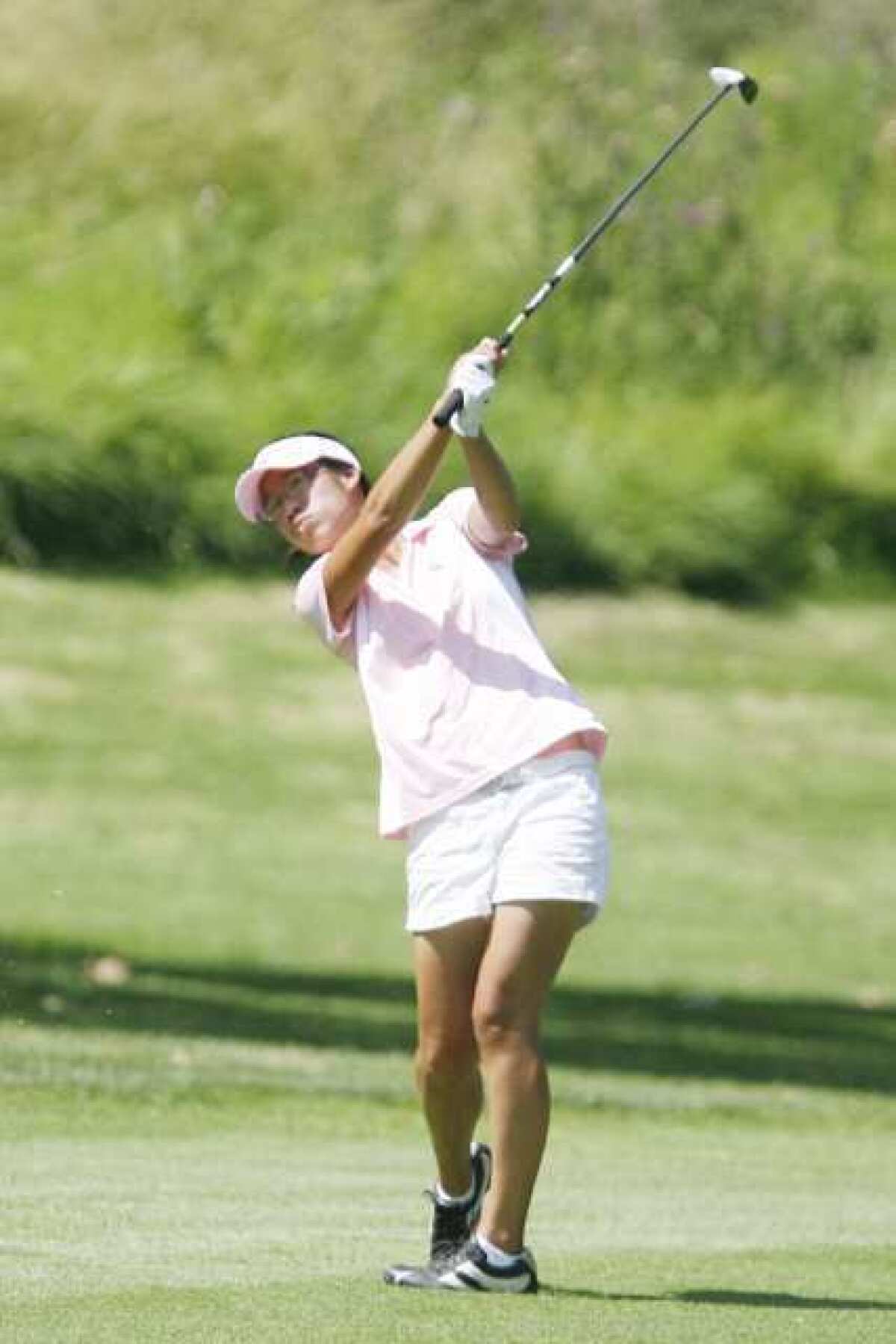 Crescenta Valley's Jocelyn Chia swings in this season's first Pacific League match at De Bell Golf Club in Burbank.
