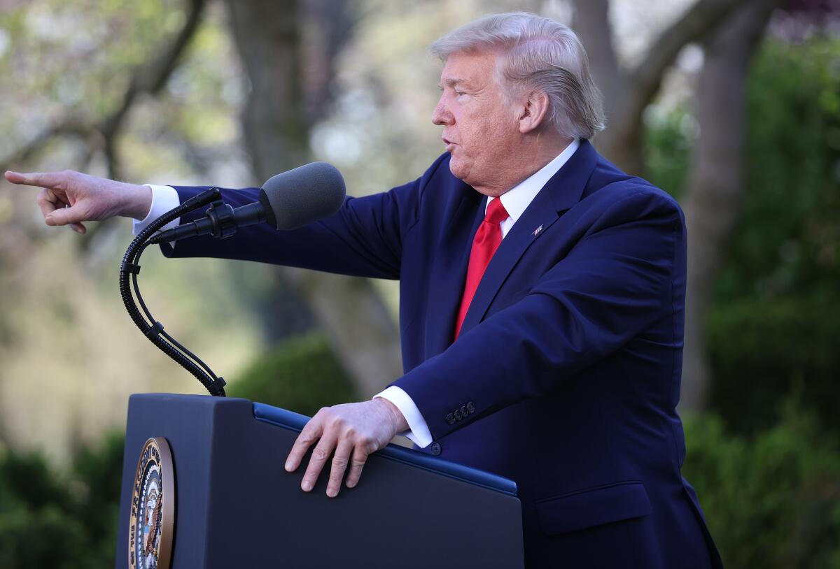 President Trump speaks during a coronavirus briefing at the White House on Monday. 