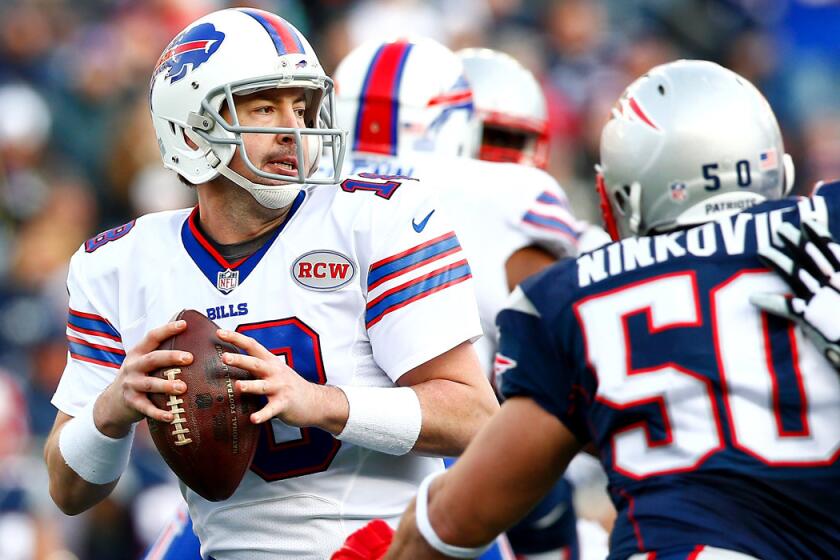 Bills quarterback Kyle Orton sets up in the pocket to pass against the Patriots in what would be his final NFL game on Sunday. Orton announced his retirement Monday.