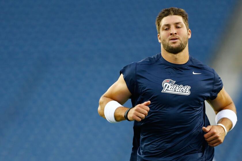 The New England Patriots parted ways with quarterback Tim Tebow on Saturday.