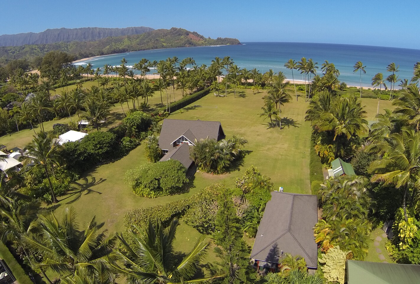 The coastal spread in the surf town of Hanalei includes a main house, guesthouse, lanai and 213 feet of beach frontage.