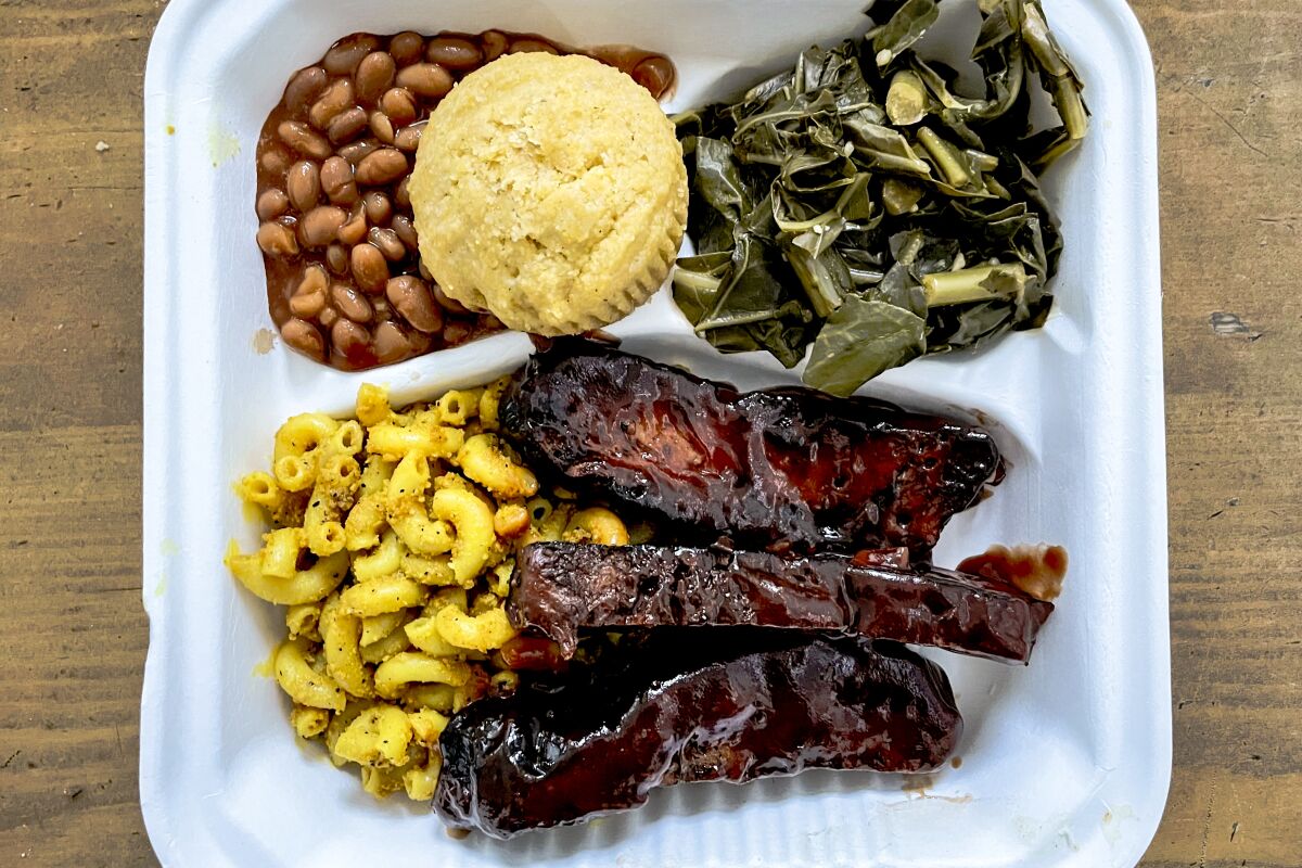 BBQ jackfruit ribz from Compton Vegan Express served with mac n' cheeze (CQ), collard greens, baked beans and cornbread.