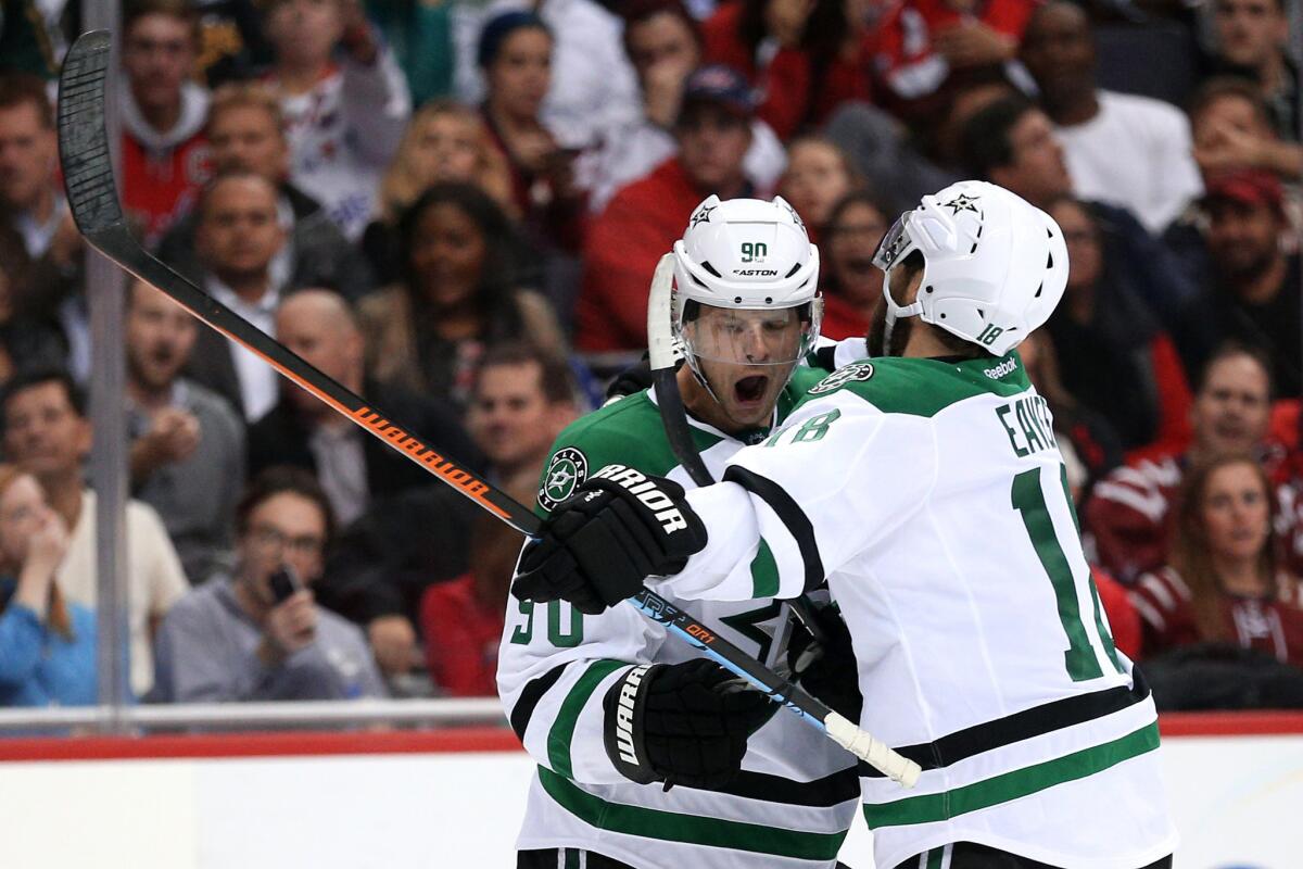 Stars' Jason Spezza celebrates a goal with teammate Patrick Eaves during a game against the Capitals.