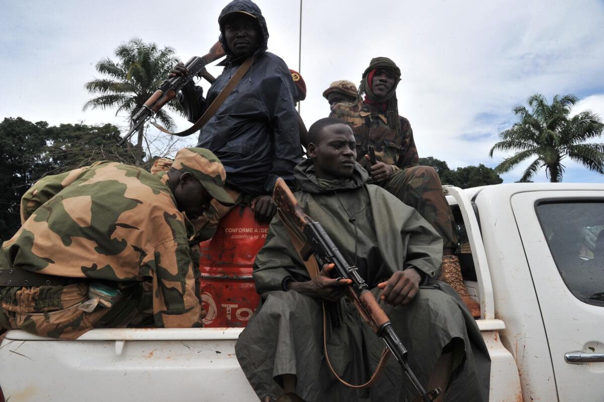 Former rebels of the Seleka coalition patrol on Oct. 8 in Bangassou.