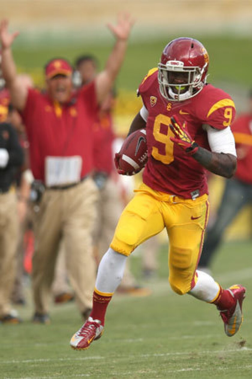 USC sophomore Marqise Lee leads major college football with a Pac-12 Conference-record 112 receptions.