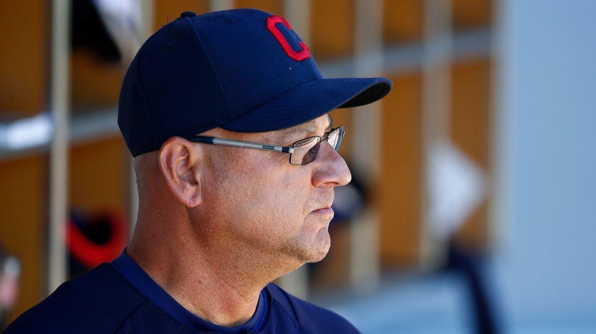 Cleveland Indians manager Terry Francona pauses in the dugout prior to the team's spring training game against the Chicago Cubs in Mesa, Ariz., on March 24.