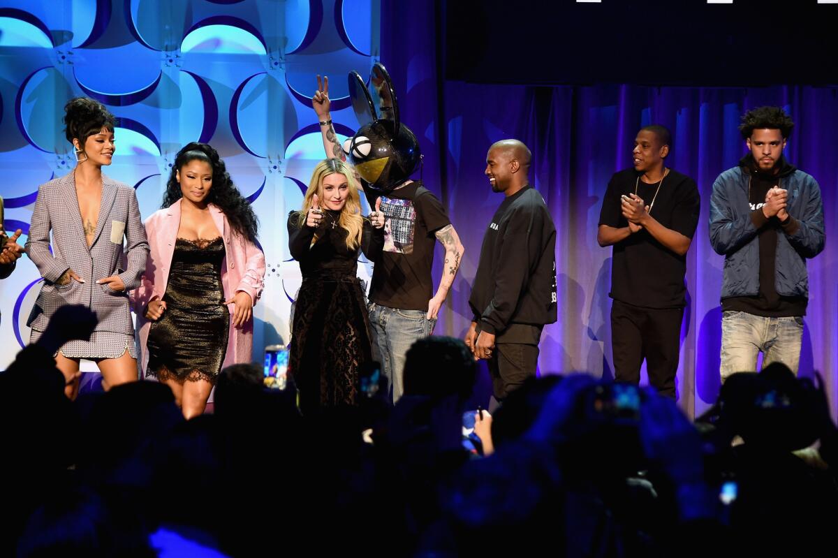 Rihanna, left, Nicki Minaj, Madonna, Deadmau5, Kanye West, Jay Z and J. Cole took the stage at the Tidal launch event on March 30 in New York City. Jay Z took to Twitter on Sunday, April 26, 2015 5o defend the streaming service using the hashtag "#TidalFacts."