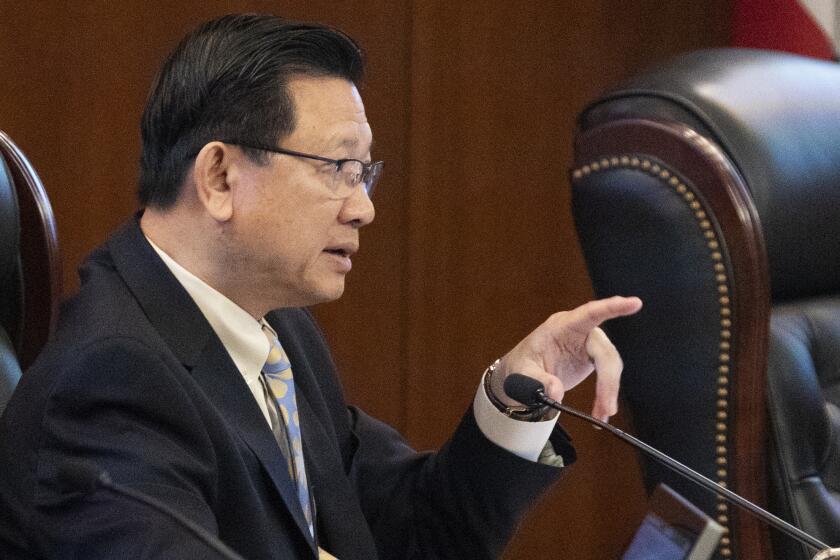 SANTA ANA, CALIF. -- TUESDAY, MARCH 17, 2020: Orange County supervisor Andrew Do during a discussion on the county's efforts to combat the coronavirus pandemic at the Hall of Administration in Santa Ana, Calif., on March 17, 2020. (Allen J. Schaben / Los Angeles Times)