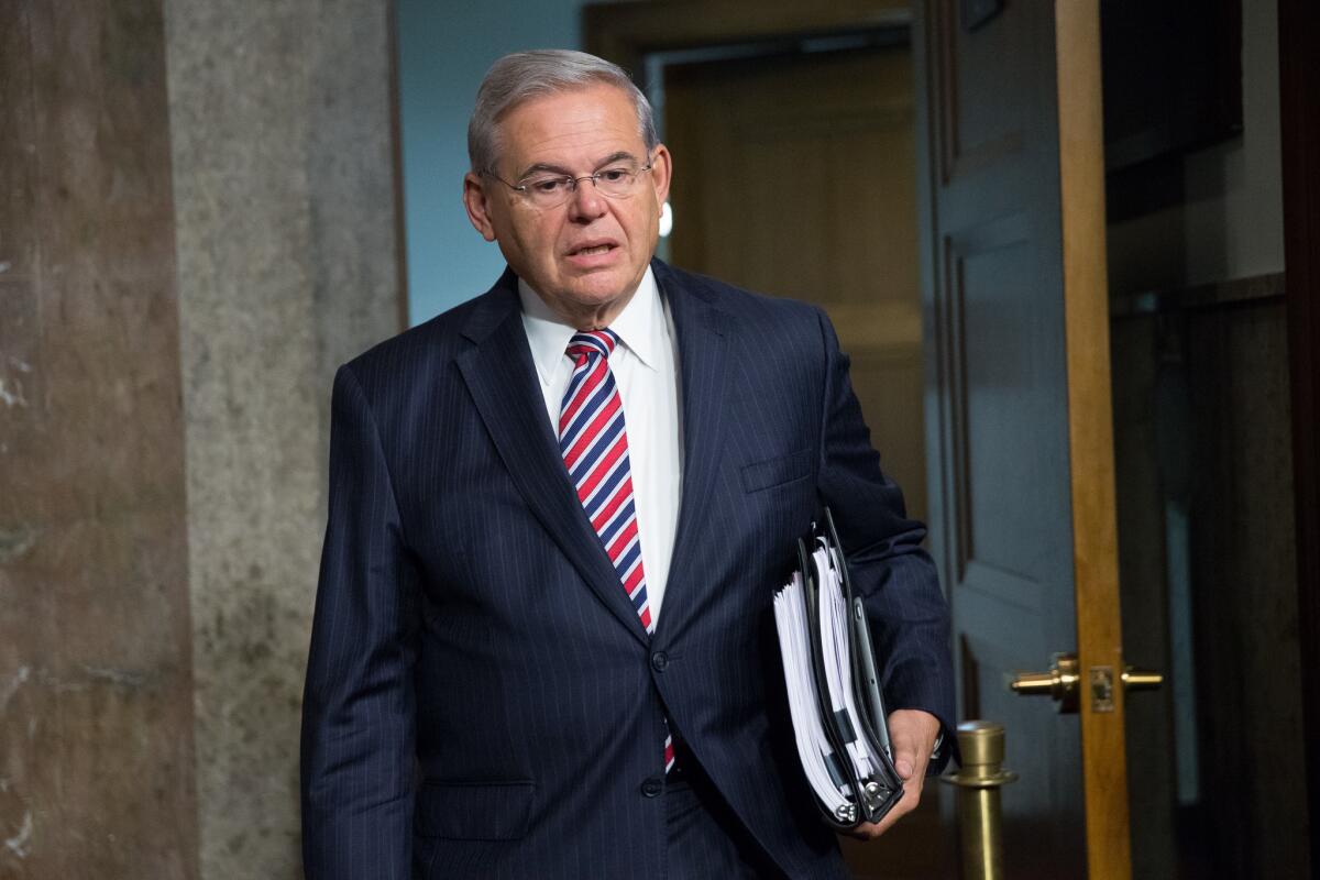 Sen. Bob Menendez arrives for a Senate Foreign Relations Committee hearing on the Iran nuclear agreement on July 23, 2015.