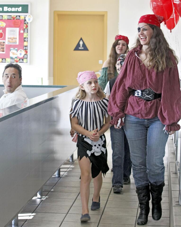 Photo Gallery: Dress Like A Pirate Day at Krispy Kreme Doughnuts