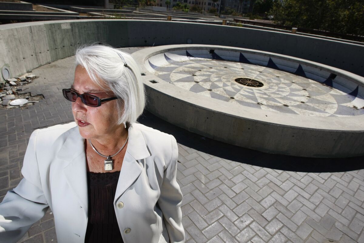 Assemblywoman Bonnie Lowenthal (D-Long Beach) examines the city's neglected roof garden in 2008.