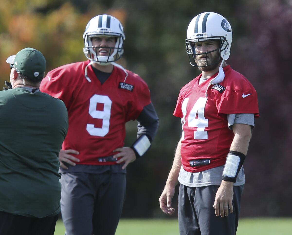 Jets quarterbacks Bryce Petty, left, and Ryan Fitzpatrick participate in a practice in Florham Park, N.J., on Oct. 26.