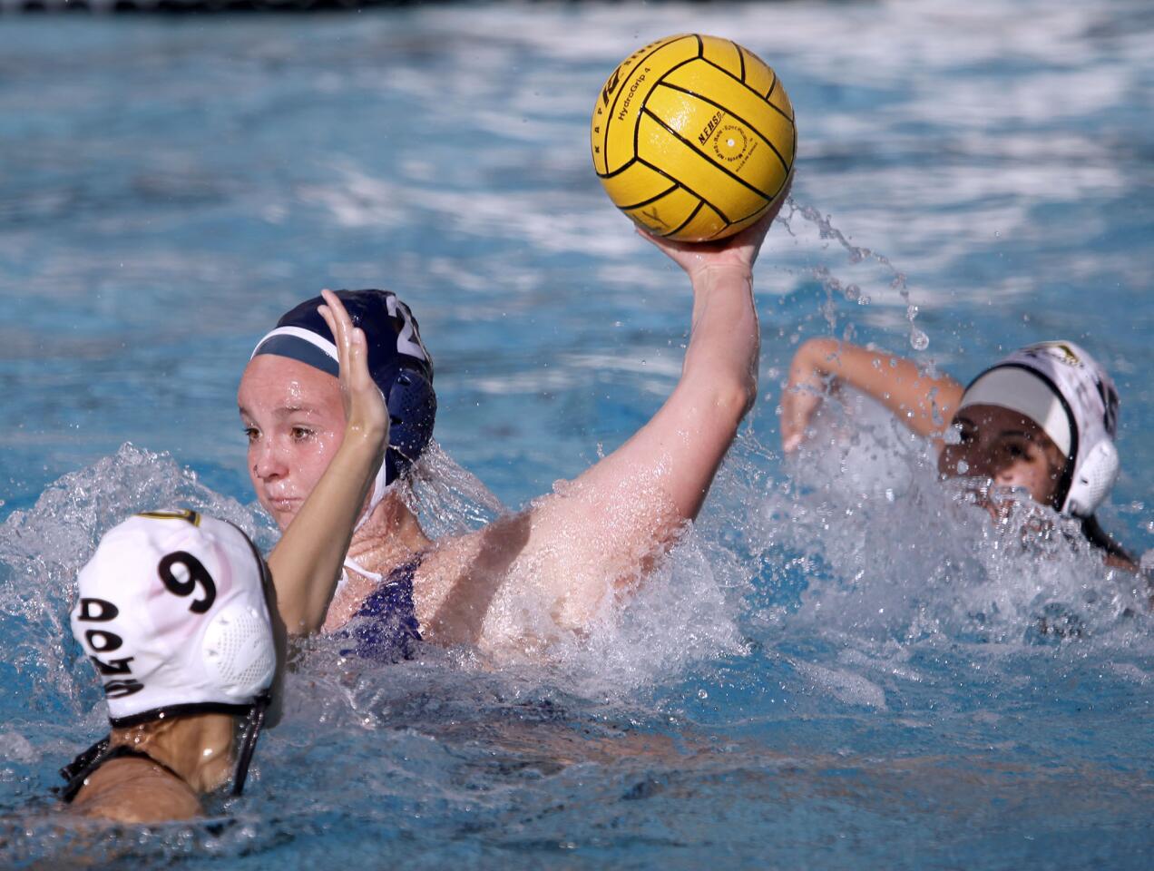 Pasadena Poly's #2 Lindsey Kelleher takes a shot on goal under pressure from Cerritos High School players during home game in Pasadena on Friday, February 8, 2013. Poly lost the non-conference match 12-14.