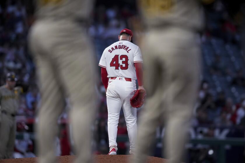 Los Angeles Angels starting pitcher Patrick Sandoval (43) walks off the mound during the sixth inning of the team's baseball game against the San Diego Padres in Anaheim, Calif., Tuesday, June 4, 2024. (AP Photo/Eric Thayer)