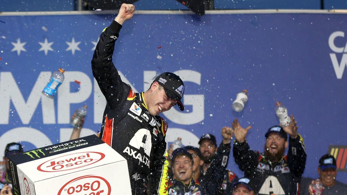 Alex Bowman celebrates after winning a NASCAR Cup series race at Chicagoland Speedway on Sunday.